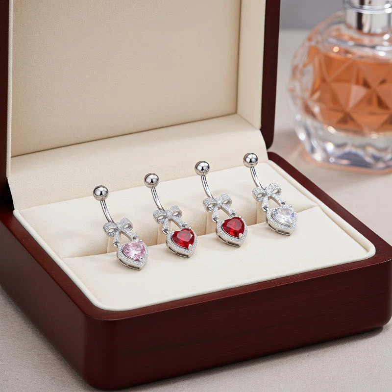 حلقات سرة البطن المصنوعة من ال - مراجعة Body Jewelry Tunnels وسعره
